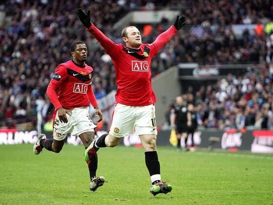 Wayne Rooney (R) of Manchester United celebrates scoring his side s second goal with teammate Patrice Evra - Carling Cup Final, Aston Villa (white) vs. Manchester United (red) 28th February, 2010 EDITORIAL USE ONLY. No use with unauthorised audio, video, data, fixture lists, club league logos or live services. Online in-match use limited to 120 images, no video emulation. No use in betting, games or single club league player publications. o0 Manu Jubel Freude