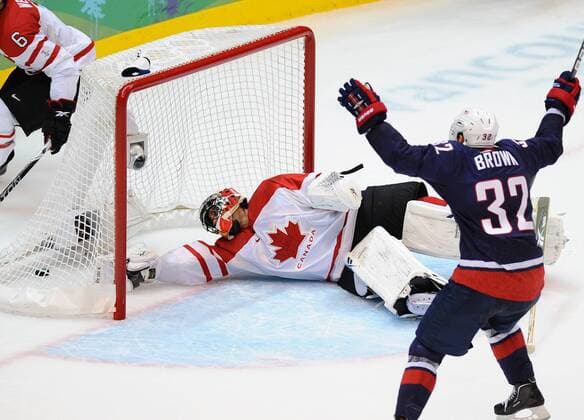 USA s Dustin Brown celebrates a goal by USA s Ryan Kesler on Canada s Roberto Luongo in the second period of the men s ice hockey final at Canada Hockey Place in Vancouver, Canada, during the 2010 Winter Olympics on February 28, 2010.  OLY2010022810 o0 Jubel Freude Tor