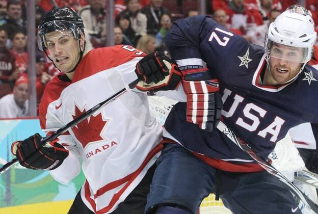 Feb. 28, 2010 - Vancouver, BC, Canada - Canada s RYAN GETZLAF (L) and USA s RYAN MALONE battle during second period of the men s Goldmedal hockey match at Canada Hockey Place in Vancouver, BC during the 2010 Winter Olympics, February 28, 2010. - ZUMAw51