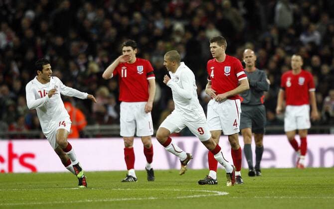 Egypt s Mohamed Zidan (C) celebrates scoring his sides opening goal in front of Steven Gerrard (R) of England International Friendly England v Egypt 3rd March, 2010 EDITORIAL USE ONLY. No use with unauthorised audio, video, data, fixture lists, club league logos or live services. Online in-match use limited to 120 images, no video emulation. No use in betting, games or single club league player publications. o0 Jubel, Freude