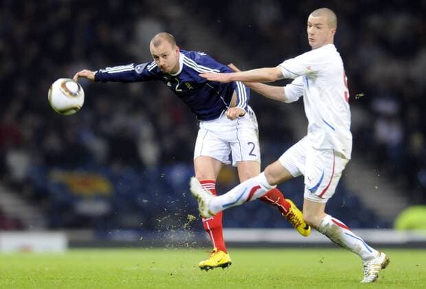 Mar 03, 2010 - Edinburgh, Scotland - International football. Scotland (blue) versus Czech Republic (white), at Hampden Park, Glasgow. Scotland s Alan Hutton and Czech s Vaclav Sverkos  - ZUMAts3