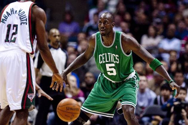March 09, 2010 Milwaukee, WI. Bradley Center..Boston Celtics Kevin Garnett 5 plays some defense on Bucks Luc Richard Mbah a Moute 12, Garnett had 14 points and 10 rebounds against the Bucks tonight..Milwaukee Buck won over the Boston Celtics 86-84. - ZUMAcc9