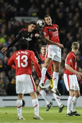Manchester 10 03 2010 - Champions League - Manchester United vs. AC Milan - Marco Borriello (Milan, L) and Rio Ferdinand (Manchester) - 