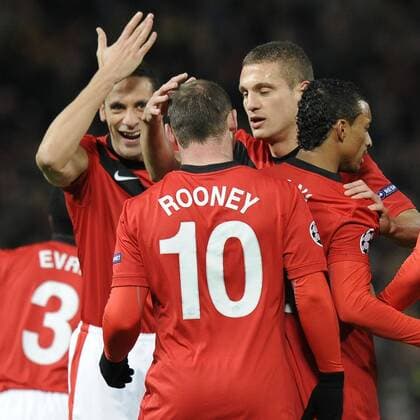 Manchester 10 03 2010 - Champions League - Manchester United vs. AC Milan - Wayne Rooney (C) and Rio Ferdinand (Manchester, L) 