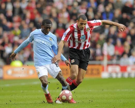 Sunderland AFC s Anton Ferdinand (R) and Manchester City s Shaun Wright-Phillips. Barclays Premier League Sunderland AFC v Manchester City 14th March, 2010 EDITORIAL USE ONLY. No use with unauthorised audio, video, data, fixture lists, club league logos or live services. Online in-match use limited to 120 images, no video emulation. No use in betting, games or single club league player publications.