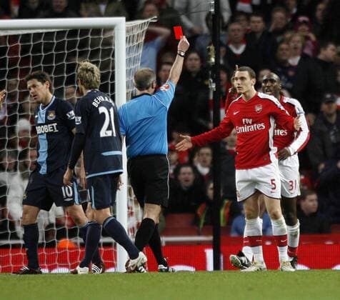 Arsenal s Thomas Vermaelen gets sent off Barclays Premier League FC Arsenal v West Ham United 20th March, 2010 EDITORIAL USE ONLY. No use with unauthorised audio, video, data, fixture lists, club league logos or live services. Online in-match use limited to 120 images, no video emulation. No use in betting, games or single club league player publications.