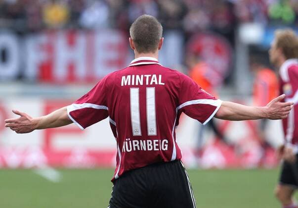 Marek MINTAL (Nuernberg 11) gibt Anweisungen - Nuernberg, 20.03.2010, 1. FC NUERNBERG (rot) - TSG 1899 HOFFENHEIM (weiß)