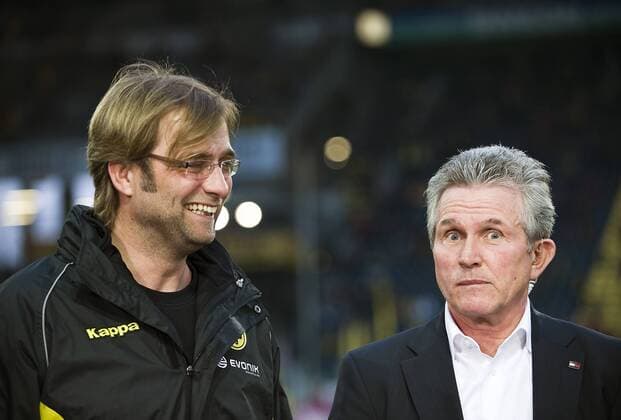 Trainer Juergen KLOPP l. (BVB) lacht waehrend Trainer Jupp HEYNCKES r. (LEV) ernst blickt, Fussball 1. Bundesliga, Borussia Dortmund - Bayer 04 Leverkusen 3:0, am 20.03.2010 in Dortmund
