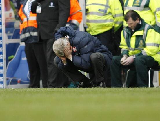 Arsenal s coach Arsene Wenger reacts after his side concede a late goal, Barclays Premier League Birmingham City v Arsenal, 27th March, 2010 EDITORIAL USE ONLY. No use with unauthorised audio, video, data, fixture lists, club league logos or live services. Online in-match use limited to 120 images, no video emulation. No use in betting, games or single club league player publications.