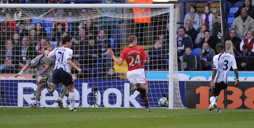 Jlloyd Samuel of Bolton Wanderers (R) scores an own goal Barclays Premier League Bolton Wanderers v Manchester United 27th March, 2010 EDITORIAL USE ONLY. No use with unauthorised audio, video, data, fixture lists, club league logos or live services. Online in-match use limited to 120 images, no video emulation. No use in betting, games or single club league player publications. o0 Tor Eigentor