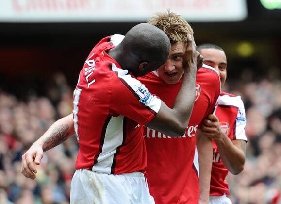 Premier League - Arsenal FC London - Wolverhampton Wanderers 1:0 - Arsenal s Nicklas Bendtner (R) celebrates with Sol Campbell having scored the winning goal in the last minutes of the game at the Emirates Stadium in London 
