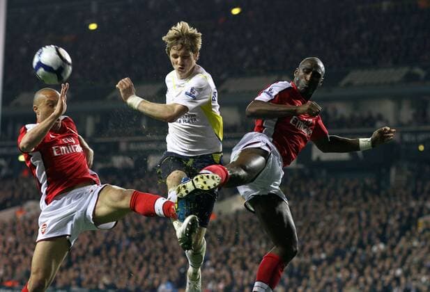 Tottenham Hotspur (white) v Arsenal London (red) . . 14.04.10 LtoR Mikael Silvestre (A) Roman Pavlyuchenko (TH) Sol Campbell (A) 