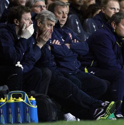 Tottenham Hotspur (white) v Arsenal London (red) . . 14.04.10 Arsenal coach Arsene Wenger, dejection. 