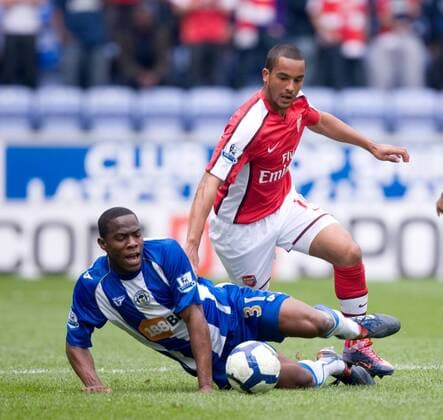 Maynor Figueroa of Wigan Athletic (L) beaten by Theo Walcott of Arsenal FC London - Barclays Premier League Wigan Athletic v Arsenal 18th April, 2010 EDITORIAL USE ONLY. No use with unauthorised audio, video, data, fixture lists, club league logos or live services. Online in-match use limited to 120 images, no video emulation. No use in betting, games or single club league player publications.