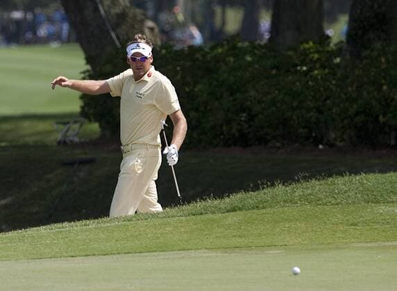 Ian Poulter, from Woburn, England, watches his bumker shot on the number nine green during the first round of The Players Championship PGA golf tournament in Ponte Vedra Beach -  PVB2010050612
