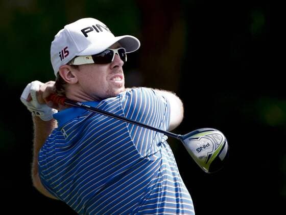 Hunter Mahan (USA) watches his tee shot from the 9th tee during the first round of The Players Championship PGA golf tournament in Ponte Vedra Beach -  PVB2010050610