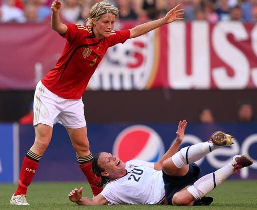 22 MAY 2010: Germany s Saskia Bartusiak (L) reacts after being called for pulling down USA s Abby Wambach during the first half of their International Friendly match at Cleveland Browns Stadium in Cleveland Ohio May 22, 2010. Icon22762164 o00 DFB EDITORIAL USE ONLY