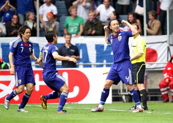 Marcus Tulio Tanaka of Japan (R) celebrates scoring his side s first goal --- International Friendly Japan vs England 30th May, 2010 EDITORIAL USE ONLY. No use with unauthorised audio, video, data, fixture lists, club league logos or live services. Online in-match use limited to 120 images, no video emulation. No use in betting, games or single club league player publications. o0 Jubel Freude
