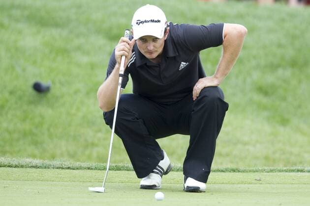 Justin Rose (England) lines up a putt on the par 4, 14th hole during the final round of the Memorial Tournament held at Muirfield Village G.C. in Dublin, Ohio. Icon4391006067786 EDITORIAL USE ONLY