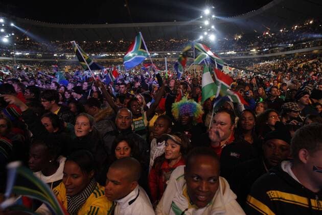 SOWETO, ? 10 June 2010: Thousands of excited soccer and music lovers attend the kick-off celebration concert at Orlando Stadium in Soweto, on 10 June 2010. Gallo0000115065 o0 Fan, Publikum totale