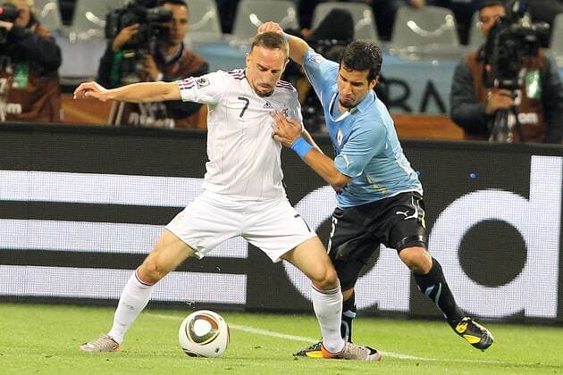 Uruguay vs France (white) - Franck Ribery (FRA) vs Mauricio Victorino (URUGUAY) - - 11-06-10 EddyLEMAISTRE 