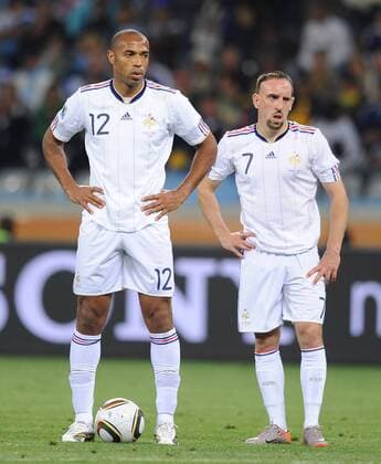 French Thierry Henry (L) and Franck Ribery wait for the free-kick during a Group match of the 2010 World Cup between France and Uruguay in Cape Town, on June 11, 2010. - France (white) vs Uruguay - 