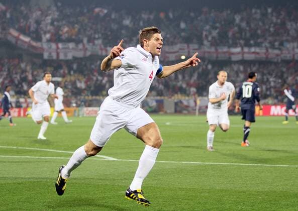 England s Steven Gerrard celebrates scoring his sides opening goal FIFA World Cup 2010 Group C England v USA 12th June, 2010 EDITORIAL USE ONLY. No use with unauthorised audio, video, data, fixture lists, club league logos or live services. Online in-match use limited to 120 images, no video emulation. No use in betting, games or single club league player publications.