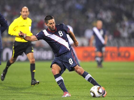 Clint Dempsey of USA shoots to score at FIFA World Cup 2010 Group C England v USA 12th June, 2010 EDITORIAL USE ONLY. No use with unauthorised audio, video, data, fixture lists, club league logos or live services. Online in-match use limited to 120 images, no video emulation. No use in betting, games or single club league player publications.