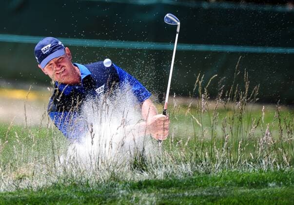 Ernie Els of South Africa hits out of a bunker on the 2nd fairway during a practice round prior to the 2010 U.S. Open at the Pebble Beach, California, on June 16, 2010.  SFP20100616318