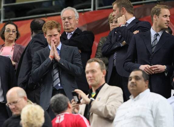 Prince Harry of Wales prays for England FIFA World Cup 2010 Group C England v Algeria 18th June, 2010 EDITORIAL USE ONLY. No use with unauthorised audio, video, data, fixture lists, club league logos or live services. Online in-match use limited to 120 images, no video emulation. No use in betting, games or single club league player publications. o0 Cape Town