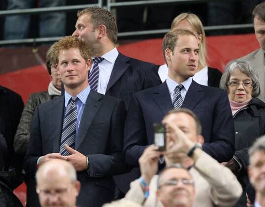 Prince Harry of Wales (L) and Prince William of Wales support England FIFA World Cup 2010 Group C England v Algeria 18th June, 2010 EDITORIAL USE ONLY. No use with unauthorised audio, video, data, fixture lists, club league logos or live services. Online in-match use limited to 120 images, no video emulation. No use in betting, games or single club league player publications. o0 Cape Town