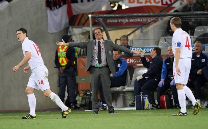 England s Coach Fabio Capello (C) looks on dejected FIFA World Cup 2010 Group C England v Algeria 18th June, 2010 EDITORIAL USE ONLY. No use with unauthorised audio, video, data, fixture lists, club league logos or live services. Online in-match use limited to 120 images, no video emulation. No use in betting, games or single club league player publications. o0 Cape Town