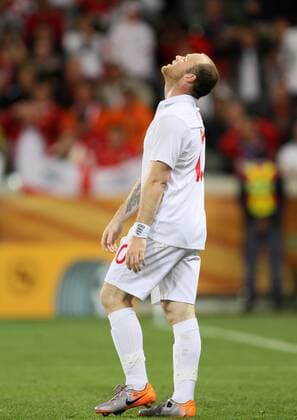 England s Wayne Rooney looks on dejected FIFA World Cup 2010 Group C England v Algeria 18th June, 2010 EDITORIAL USE ONLY. No use with unauthorised audio, video, data, fixture lists, club league logos or live services. Online in-match use limited to 120 images, no video emulation. No use in betting, games or single club league player publications. o0 Cape Town