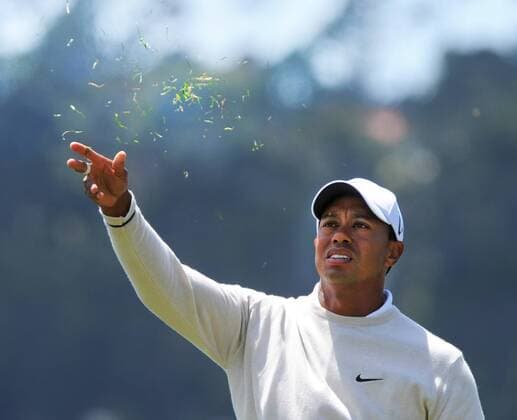 Tiger Woods (USA) tests the wind on the fifth tee on the day three of the U.S. Open in Pebble Beach, California on June 19, 2010.  PBP2010061906