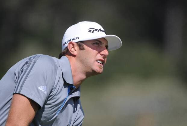 Dustin Johnson (USA) leans as he watches his drive off the third tee on the day three of the U.S. Open in Pebble Beach, California on June 19, 2010.  PBP2010061916