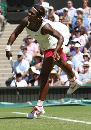 Serena Williams (USA) serves in her match on the second day of the Wimbledon championships in Wimbledon on Tuesday June 22 2010.  LON2010062208