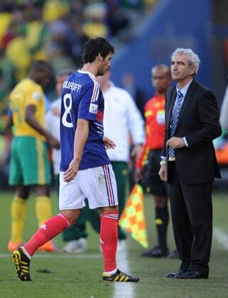 France s Yoann Gourcuff (L) walks out of the pitch after being shown a red card during a Group A match between France and South Africa at the 2010 World Cup football match in Bloemfontein - 