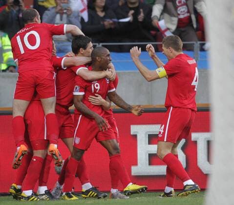 (100623) -- PORT ELIZABETH, June 23, 2010 () -- England s Jermain Defoe (2nd R) celebrates his scoring with teammates during the 2010 World Cup Group C soccer match against Slovenia at Nelson Mandela Bay stadium in Port Elizabeth, June 23, 2010. - 
