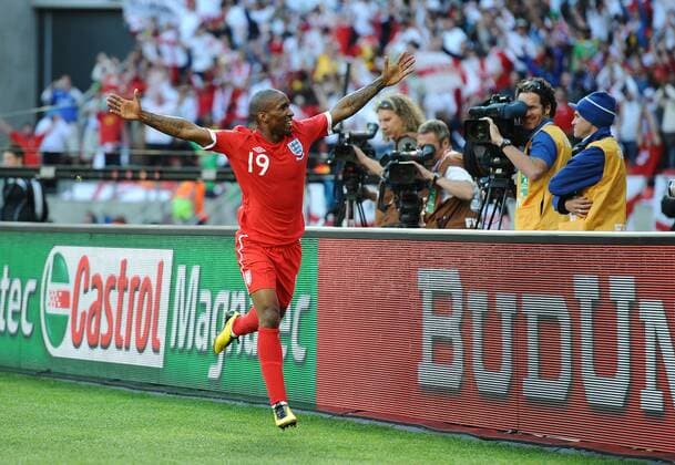 Football - 2010 FIFA World Cup - Slovenia vs. England, England s Jermain Defoe celebrates scoring their opening goal at the Nelson Mandela Bay Stadium, Port Elizabeth 
