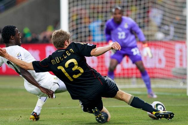 Thomas MUELLER (GER, R), Hans SARPEI (Ghana) - 23 06 2010. x(4)xAndrexChacox xFotoarenax  (813)