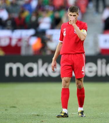 England s Steven Gerrard looks on dejected Slovenia v England 23rd June, 2010 EDITORIAL USE ONLY. No use with unauthorised audio, video, data, fixture lists, club league logos or live services. Online in-match use limited to 120 images, no video emulation. No use in betting, games or single club league player publications.