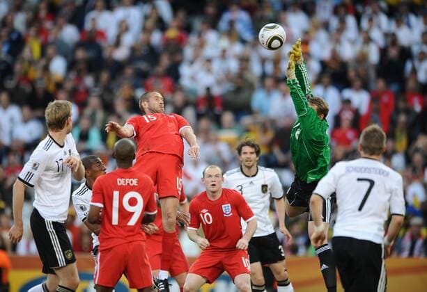 Football - 2010 FIFA World Cup - 2nd Round - Germany vs. England England s Matthew Upson (4th L) scores their first goal to take the score to 2-1 against Manuel Neuer of Germany (R) at the Free State Stadium, Bloemfontein  o0 Tor
