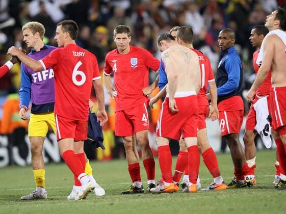 England s Steven Gerrard (C) looks on dejected FIFA World Cup 2010 Round of 16 Germany v England 27th June, 2010 EDITORIAL USE ONLY. No use with unauthorised audio, video, data, fixture lists, club league logos or live services. Online in-match use limited to 120 images, no video emulation. No use in betting, games or single club league player publications.