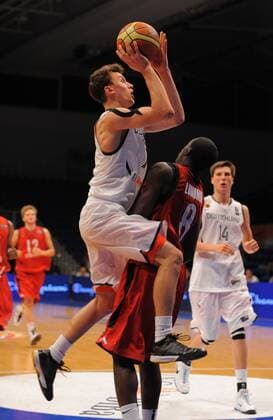 Germany (white) vs Canada (red), Day 1 of the 2010 FIBA U17 World Championship in Hamburg, Germany. 02 07 2010, preliminary round. Albert Junior LOMOMBA (Canada), Besnik Bekteshi (GER)