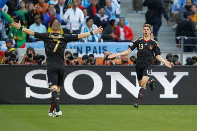 Thomas Müller (R) celebrates with Bastian Schweinsteiger of Germany during the 2010 World Cup quarterfinal soccer match between Germany and Argentina in Cape Town on July 3,2010.  o0 Freude Werbebande, Bande, Sponsor, Werbepartner, Werbung, Wirtschaft Sony