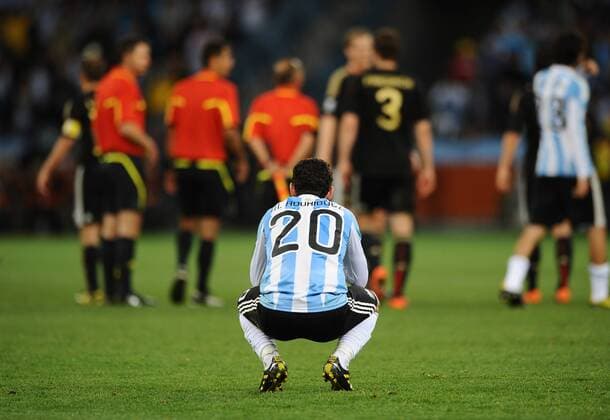 Football - 2010 FIFA World Cup - QuarterFinal - Argentina vs. Germany Maxi Rodriguez of Argentina looks dejected at Green Point Stadium, Cape Town 