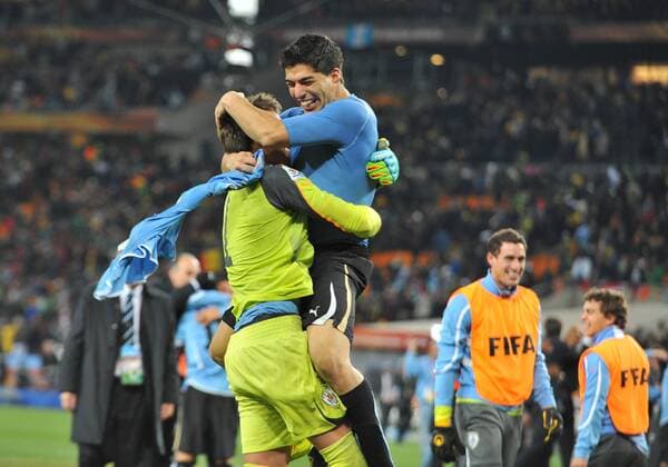 2 July 2010: Uruguay forward Luis Suarez (9) celebrates winning the penalty shoot out with goalkeeper Fernando Muslera (1) during the game between Ghana and Uruguay at Soccer City in the FIFA World Cup 2010. Icon010100702192 o0 Jubel, Freude EDITORIAL USE ONLY