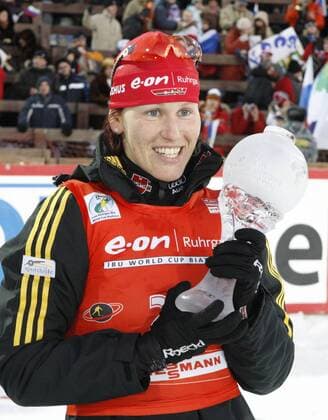 Germany s Kati Wilhelm holds her World Cup trophy after winning the women s 10km pursuit at the Biathlon World Cup Final event in Khanty Mansiysk -  759367