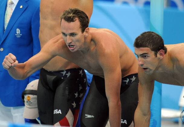 Aaron Peirsol (L) and Michael Phelps (USA) pictured after winning the 4x100m medley relay at the Beijing Olympic Games.  651418