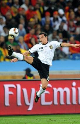 Piotr Trochowski of Germany reacts during the 2010 World Cup semifinal soccer match between Germany and Spain in Durban on July 7, 2010.  o0 kurios, Werbebande, Bande, Werbung, Schriftzug, fly